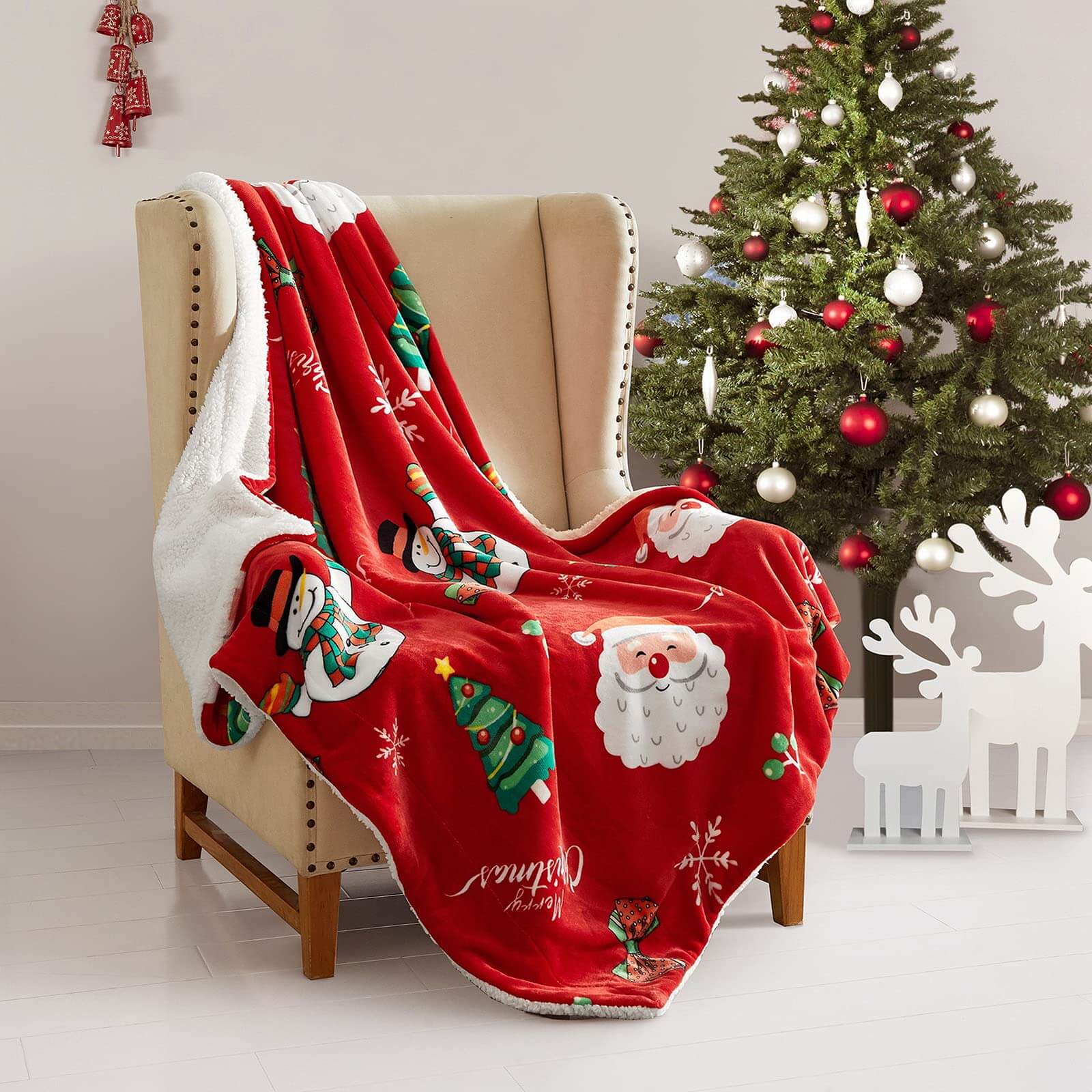 Custom Christmas fleece sherpa blanket with Santa print on armchair
